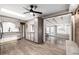 Bright kitchen with light cabinets, stainless steel appliances and a large opening to the dining area at 6598 S Logan St, Centennial, CO 80121