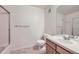 Cozy bathroom with a shower/tub combo, single sink vanity, and neutral-toned flooring at 3375 Boulder Cir # 204, Broomfield, CO 80023