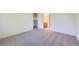 Spacious bedroom with carpet and en suite bathroom at 3375 Boulder Cir # 204, Broomfield, CO 80023