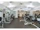 Fully equipped gym with modern fitness machines and ample workout space at 8367 Devinney St, Arvada, CO 80005