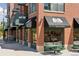 Commercial property with dining area and street seating at 8367 Devinney St, Arvada, CO 80005