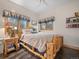 Cozy bedroom featuring rustic log furniture and decor to complement the woodland scenery at 23076 Oehlmann Park Rd, Conifer, CO 80433