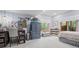 Bedroom with a desk, armoire, and a window with views of the surrounding nature at 23076 Oehlmann Park Rd, Conifer, CO 80433