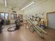 Spacious workshop area with many tools and workbenches along the pegboard paneling walls at 23076 Oehlmann Park Rd, Conifer, CO 80433
