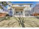 Exterior view of the backyard with the well-maintained lawn and patio, perfect for entertaining at 17798 E Ida Ave, Centennial, CO 80015