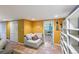 Basement area with tiled flooring, seating area and view to the adjacent room through the doorway at 3242 Utica St, Denver, CO 80212
