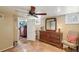 Relaxing bathroom featuring a wooden dresser, tiled floor, and calm color palette at 3242 Utica St, Denver, CO 80212