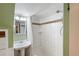 Bright bathroom offering tub with shower and classic fixtures at 3242 Utica St, Denver, CO 80212