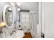 Charming bathroom with a classic sink, and a shower-over-tub at 3242 Utica St, Denver, CO 80212