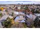 Aerial view of homes with city skyline in background at 111 Blue Heron Cir, Greenwood Village, CO 80121