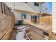 Backyard patio with access to the back door at 1170 S Troy St, Aurora, CO 80012