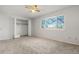 Bedroom with window and large closet at 1170 S Troy St, Aurora, CO 80012