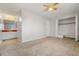 Spacious bedroom with ceiling fan and closet at 1170 S Troy St, Aurora, CO 80012