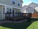 A spacious backyard featuring a deck area, perfect for outdoor entertaining and relaxation at 13755 W Amherst Way, Lakewood, CO 80228