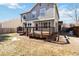 Exterior of home showing the deck and fenced yard at 13755 W Amherst Way, Lakewood, CO 80228