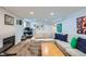 Versatile basement is great for relaxing or working and has a fireplace for cozy days at 2060 Ash St, Denver, CO 80207