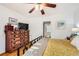 Comfortable bedroom with hardwood floors and a large dresser at 2060 Ash St, Denver, CO 80207