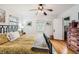 Bedroom with two windows and a bed with patterned bedding at 2060 Ash St, Denver, CO 80207
