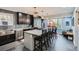 Modern kitchen with marble countertops, stainless steel appliances and a center island at 2060 Ash St, Denver, CO 80207