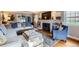 Bright living room with hardwood floors, fireplace, and comfortable seating at 2060 Ash St, Denver, CO 80207