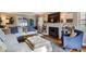 Bright living room with hardwood floors, fireplace, and comfortable seating at 2060 Ash St, Denver, CO 80207