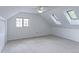 Spacious finished attic with skylights and ceiling fan at 4877 Darwin Ct, Boulder, CO 80301