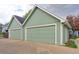 Three car garage with new solar panels on roof at 4877 Darwin Ct, Boulder, CO 80301