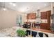 Updated kitchen features granite countertops, stainless steel appliances, and a cozy eat-in nook at 9705 Westbury Cir, Highlands Ranch, CO 80129