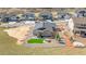 Aerial view of house in a residential area, featuring a small lawn and hot tub at 4706 Mesa Top Dr, Monument, CO 80132