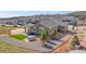 Aerial view of house with a green lawn and hot tub at 4706 Mesa Top Dr, Monument, CO 80132