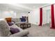 Inviting living room with comfortable seating, ambient lighting, and entertainment area at 4706 Mesa Top Dr, Monument, CO 80132
