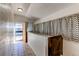 Hallway with patterned curtains and access to exterior at 3206 Madison, Denver, CO 80205