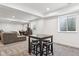 Carpeted basement with a table and seating, a sofa, and recessed lighting at 2548 Horsehound Pl, Castle Rock, CO 80104