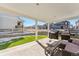 Covered patio with outdoor furniture and grill, perfect for entertaining at 2548 Horsehound Pl, Castle Rock, CO 80104