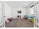 ' playroom with carpeted floors, toys, and natural light at 2548 Horsehound Pl, Castle Rock, CO 80104