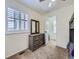 Cozy bedroom with ample storage and natural light from the window at 5130 Morning Glory Pl, Highlands Ranch, CO 80130