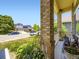 Charming front porch with views of the neighborhood and lush landscaping at 5130 Morning Glory Pl, Highlands Ranch, CO 80130