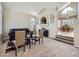 Inviting living room features stylish decor and seamless flow into the dining area at 5130 Morning Glory Pl, Highlands Ranch, CO 80130