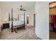 Spacious primary suite featuring a sitting area, ensuite bath, and walk-in closet at 5130 Morning Glory Pl, Highlands Ranch, CO 80130
