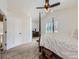 Spacious main bedroom with vaulted ceiling, plantation shutters and ceiling fan at 5130 Morning Glory Pl, Highlands Ranch, CO 80130