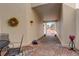 Inviting covered patio with brick flooring and a seating area at 6328 S Ouray Way, Aurora, CO 80016