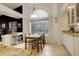 Bright breakfast nook features a window with neighborhood views at 6328 S Ouray Way, Aurora, CO 80016