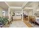 Welcoming entryway with a sitting area, showcasing the home's open-concept design at 6328 S Ouray Way, Aurora, CO 80016