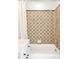 Classic bathroom featuring a tiled shower, white vanity, and a shower curtain at 3521 W 40Th Ave, Denver, CO 80211