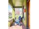 Inviting front porch with brick flooring, space for seating and views of the cheerful neighborhood at 3521 W 40Th Ave, Denver, CO 80211