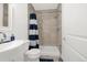 A bathroom with a shower at 118 N Newcastle Way, Aurora, CO 80018