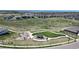 Picturesque aerial view of a Gathering park nestled within a vibrant residential community at 22674 E Henderson Dr, Aurora, CO 80016
