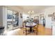 Dining room with a chandelier, table setting, and sliding glass doors to the patio at 22674 E Henderson Dr, Aurora, CO 80016