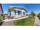 Attractive home with stone accents, professional landscaping and a convenient walking path at 22674 E Henderson Dr, Aurora, CO 80016