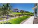 Inviting two-story home with a private entrance and well-manicured front yard at 22674 E Henderson Dr, Aurora, CO 80016